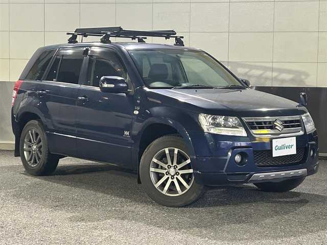 スズキ エスクード 2．7 ヘリーハンセンリミテッド 東京都 2007(平19)年 0.8万km キャッツアイブルーメタリック ワンオーナー/フルタイム４WD/サンルーフ/社外オーディオ/シートヒーター/社外１７インチアルミホイール/純正フロアマット/TERZOルーフキャリア/HELLY　HANSENラケッジマット/ドアバイザー/電動格納ミラー/保証書/取扱説明書