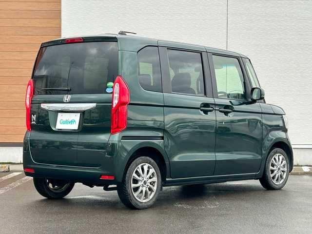 ホンダ Ｎ ＢＯＸ G L ターボ ホンダセンシング 秋田県 2020(令2)年 5.1万km ブリティッシュグリーンP 4WD/両側パワースライドドア/衝突被害軽減システム/LEDヘッドライト/純正メモリナビ(CD/BT/AM/FM/USB)/バックカメラ/スマートキー/アイドリングストップ/プッシュスタート/クルーズコントロール追従走行有/ステアリングスイッチ/前席シートヒーター/ビルトインETC/純正フロアマット/オートライト/オートマチックハイビーム/オートエアコン/パワーステアリング/パワーウィンドウ/パドルシフト/横滑り防止/盗難防止装置/寒冷地仕様/電動格納ウィンカーミラー/保証書/取扱説明書/記録簿/スペアキー×1