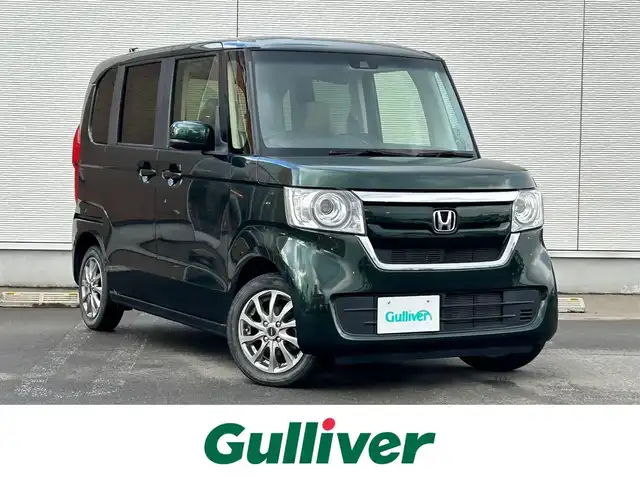 ホンダ Ｎ ＢＯＸ G L ターボ ホンダセンシング 秋田県 2020(令2)年 5.1万km ブリティッシュグリーンP 4WD/両側パワースライドドア/衝突被害軽減システム/LEDヘッドライト/純正メモリナビ(CD/BT/AM/FM/USB)/バックカメラ/スマートキー/アイドリングストップ/プッシュスタート/クルーズコントロール追従走行有/ステアリングスイッチ/前席シートヒーター/ビルトインETC/純正フロアマット/オートライト/オートマチックハイビーム/オートエアコン/パワーステアリング/パワーウィンドウ/パドルシフト/横滑り防止/盗難防止装置/寒冷地仕様/電動格納ウィンカーミラー/保証書/取扱説明書/記録簿/スペアキー×1