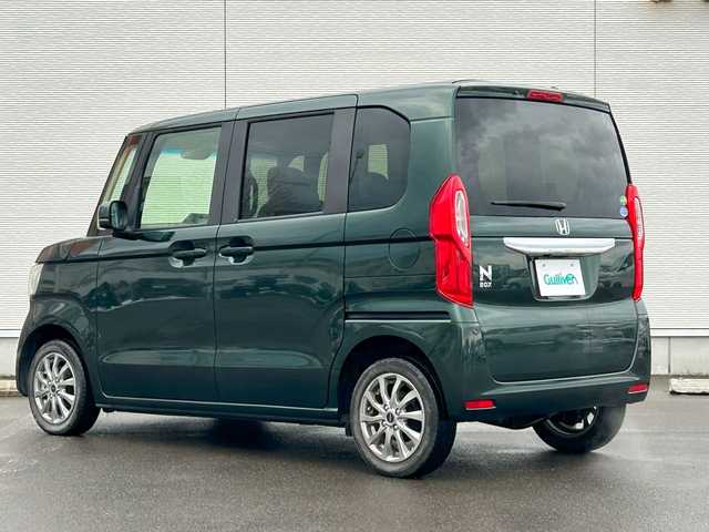 ホンダ Ｎ ＢＯＸ G L ターボ ホンダセンシング 秋田県 2020(令2)年 5.1万km ブリティッシュグリーンP 4WD/両側パワースライドドア/衝突被害軽減システム/LEDヘッドライト/純正メモリナビ(CD/BT/AM/FM/USB)/バックカメラ/スマートキー/アイドリングストップ/プッシュスタート/クルーズコントロール追従走行有/ステアリングスイッチ/前席シートヒーター/ビルトインETC/純正フロアマット/オートライト/オートマチックハイビーム/オートエアコン/パワーステアリング/パワーウィンドウ/パドルシフト/横滑り防止/盗難防止装置/寒冷地仕様/電動格納ウィンカーミラー/保証書/取扱説明書/記録簿/スペアキー×1