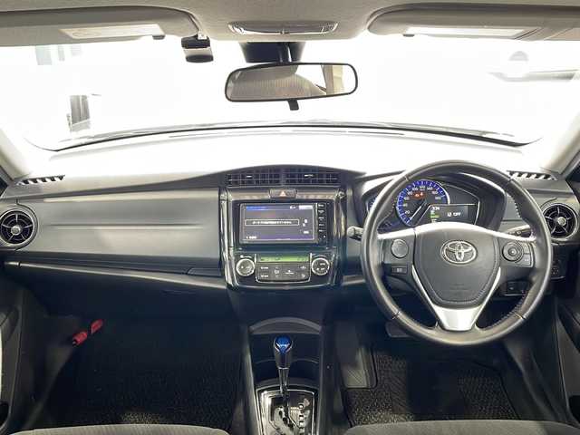 トヨタ カローラ アクシオ ハイブリッドG 愛媛県 2016(平28)年 8.9万km ホワイトパールクリスタルシャイン 純正ナビ/・ワンセグ/CD/BT/バックカメラ/プリクラッシュセーフティ/レーンキープアシスト/オートハイビーム/ステアリングスイッチ/オートライト/ウィンカーミラー/リモコンキー/電格ミラー