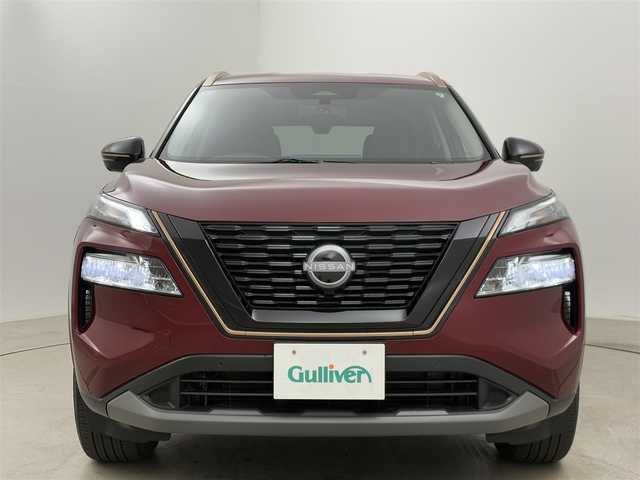 日産 エクストレイル X e－4ORCE 90周年記念車 岡山県 2024(令6)年 0.3万km 赤 純正１２．３インチナビ/プロパイロット/エマージェンシーブレーキ/アラウンドビューモニター/１００Ｖ電源/ビルドインＥＴＣ２．０/シートヒーター/ＬＥＤヘッドライト/デジタルインナーミラー/コーナーセンサー