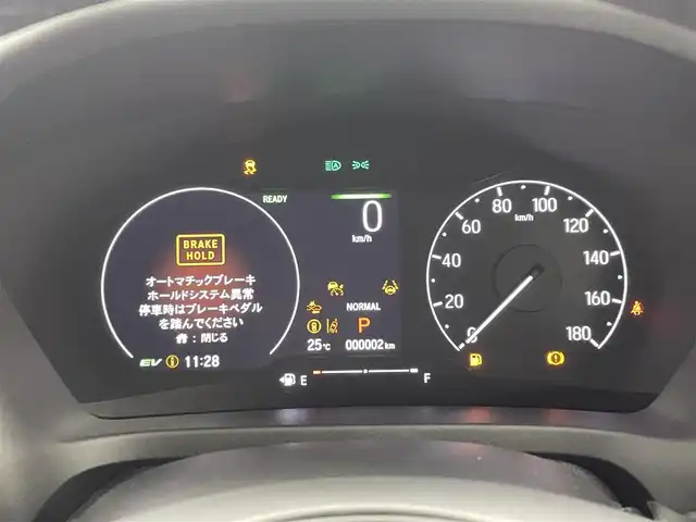 ホンダ ヴェゼル ハイブリッド e:HEV Z 熊本県 2025(令7)年 0.1万km未満 プラチナホワイトパール 登録済未使用車/純正ナビ（ＡｐｐｌＣａｒＰｌａｙ・ＡｎｄｒｏｉｄＡｕｔｏ・フルセグ・ＢＴ・ＵＳＢ）　/バックカメラ　/ビルトインＥＴＣ　/ホンダセンシング/・衝突軽減ブレーキ/・誤発進抑制機能/・後方誤発進抑制機能/・近距離衝突軽減ブレーキ/・歩行者事故低減ステアリング/・路外逸脱制御機能/・アダブティブクルーズコントロール/・渋滞運転支援機能/・先行車発進お知らせ/・標識認識システム/・ブラインドスポットモニター/・車線維持支援システム/・オートハイビーム/横滑り防止/ダウンヒルアシスト/置くだけ充電/前席シートヒーター/ステアリングヒーター/パワーバックドア/パドルシフト/ブレーキホールド/ハーフレザーシート/純正１８インチAW/フロントシーケンシャルウインカー/オートライト/LEDヘッドライト/フォグライト/スマートキー/プッシュスタート/スペアキー1本/保証書/取扱説明書