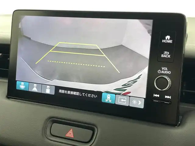 ホンダ ヴェゼル ハイブリッド e:HEV Z 熊本県 2025(令7)年 0.1万km未満 プラチナホワイトパール 登録済未使用車/純正ナビ（ＡｐｐｌＣａｒＰｌａｙ・ＡｎｄｒｏｉｄＡｕｔｏ・フルセグ・ＢＴ・ＵＳＢ）　/バックカメラ　/ビルトインＥＴＣ　/ホンダセンシング/・衝突軽減ブレーキ/・誤発進抑制機能/・後方誤発進抑制機能/・近距離衝突軽減ブレーキ/・歩行者事故低減ステアリング/・路外逸脱制御機能/・アダブティブクルーズコントロール/・渋滞運転支援機能/・先行車発進お知らせ/・標識認識システム/・ブラインドスポットモニター/・車線維持支援システム/・オートハイビーム/横滑り防止/ダウンヒルアシスト/置くだけ充電/前席シートヒーター/ステアリングヒーター/パワーバックドア/パドルシフト/ブレーキホールド/ハーフレザーシート/純正１８インチAW/フロントシーケンシャルウインカー/オートライト/LEDヘッドライト/フォグライト/スマートキー/プッシュスタート/スペアキー1本/保証書/取扱説明書