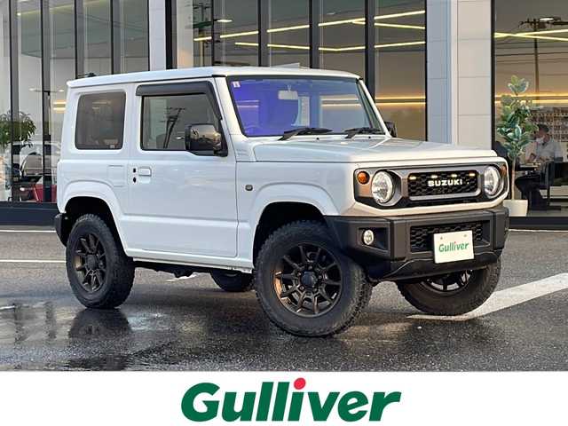 スズキ ジムニー XL 新潟県 2018(平30)年 2.4万km スペリアホワイト 4WD/5速MT/社外SDナビ/(AVN-D9)/(フルセグTV/Bluetooth/CD/DVD/USB)/バックカメラ/横滑り防止装置/盗難防止装置/ダウンヒルアシストコントロール/Ｄ＋Ｎ席シートヒーター/ETC/前方ドライブレコーダー/ラダー/社外マフラー(純正マフラー車載)/社外サイドマーカー/チューンアップトゥイーター/スペアキー1本