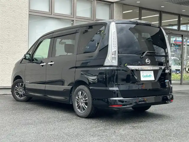 日産 セレナ ハイウェイスター Sハイブリッド 大阪府 2012(平24)年 11.8万km 黒 社外ナビ/（フルセグ／ＢＴ／ＣＤ／ＤＶＤ）/バックカメラ/横滑り機能/社外後席用モニター/純正フロアマット/両側パワースライドドア/３列シート/社外１５インチＡＷ/取扱説明書