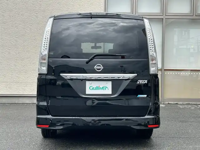 日産 セレナ ハイウェイスター Sハイブリッド 大阪府 2012(平24)年 11.8万km 黒 社外ナビ/（フルセグ／ＢＴ／ＣＤ／ＤＶＤ）/バックカメラ/横滑り機能/社外後席用モニター/純正フロアマット/両側パワースライドドア/３列シート/社外１５インチＡＷ/取扱説明書