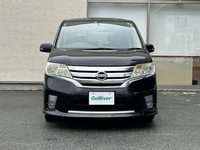 日産 セレナ ハイウェイスター Sハイブリッド 大阪府 2012(平24)年 11.8万km 黒 社外ナビ/（フルセグ／ＢＴ／ＣＤ／ＤＶＤ）/バックカメラ/横滑り機能/社外後席用モニター/純正フロアマット/両側パワースライドドア/３列シート/社外１５インチＡＷ/取扱説明書
