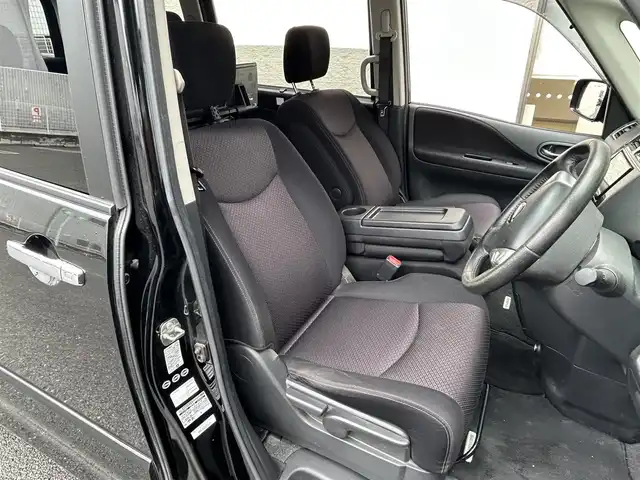 日産 セレナ ハイウェイスター Sハイブリッド 大阪府 2012(平24)年 11.8万km 黒 社外ナビ/（フルセグ／ＢＴ／ＣＤ／ＤＶＤ）/バックカメラ/横滑り機能/社外後席用モニター/純正フロアマット/両側パワースライドドア/３列シート/社外１５インチＡＷ/取扱説明書