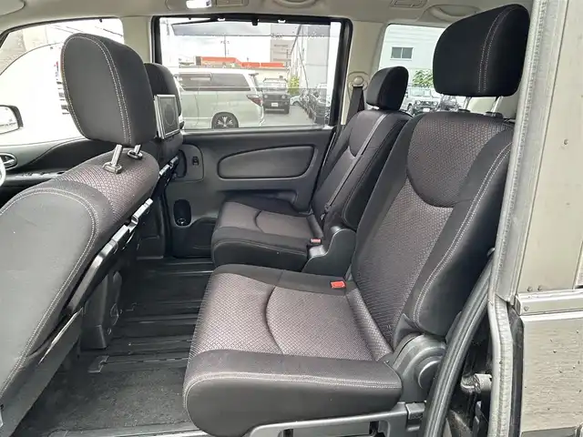 日産 セレナ ハイウェイスター Sハイブリッド 大阪府 2012(平24)年 11.8万km 黒 社外ナビ/（フルセグ／ＢＴ／ＣＤ／ＤＶＤ）/バックカメラ/横滑り機能/社外後席用モニター/純正フロアマット/両側パワースライドドア/３列シート/社外１５インチＡＷ/取扱説明書