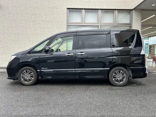 日産 セレナ ハイウェイスター Sハイブリッド 大阪府 2012(平24)年 11.8万km 黒 社外ナビ/（フルセグ／ＢＴ／ＣＤ／ＤＶＤ）/バックカメラ/横滑り機能/社外後席用モニター/純正フロアマット/両側パワースライドドア/３列シート/社外１５インチＡＷ/取扱説明書