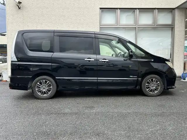 日産 セレナ ハイウェイスター Sハイブリッド 大阪府 2012(平24)年 11.8万km 黒 社外ナビ/（フルセグ／ＢＴ／ＣＤ／ＤＶＤ）/バックカメラ/横滑り機能/社外後席用モニター/純正フロアマット/両側パワースライドドア/３列シート/社外１５インチＡＷ/取扱説明書