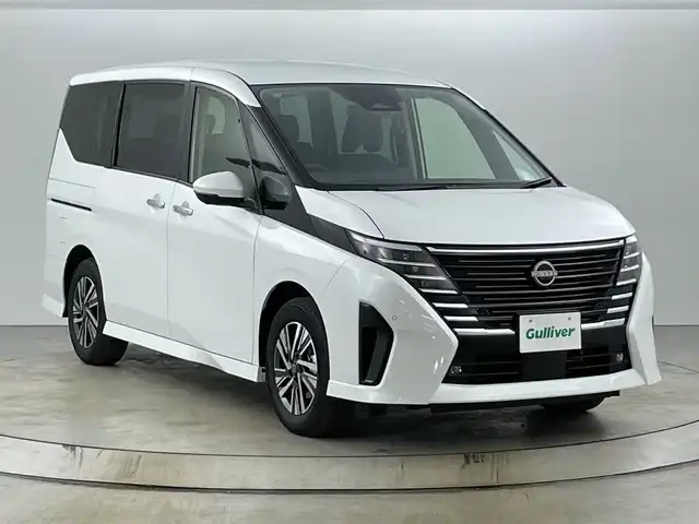 日産 セレナ e－パワー ハイウェイスター V 愛知県 2025(令7)年 0.1千km プリズムホワイト 登録済未使用車/純正12.3インチナビ/（AM/FM/Bluetooth/USB/フルセグTV）/全方位カメラ/フリップダウンモニター/ワイヤレス充電/衝突軽減ブレーキ/レーンキープアシスト/オートマチックハイビーム/プロパイロット/レーダークルーズコントロール/コーナーセンサー/ブラインドスポットモニター/デジタルインナーミラー/ETC2.0/前後ドライブレコーダー/両側パワースライドドア/純正16インチアルミホイール/スマートキー/スペアキー1本/プッシュスタート/LEDヘッドライト/フロントフォグランプ/横滑り防止装置/電子パーキングブレーキ/オートホールド/電動格納ミラー