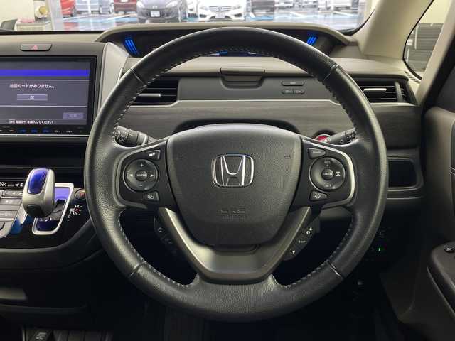 ホンダ フリード ハイブリット EX 岐阜県 2017(平29)年 6.9万km ブルーホライゾンM 純正9インチナビ/CD/DVD/Bluetooth/AM/FM/SD/バックカメラ/ホンダセンシング/衝突軽減ブレーキ/レーンキープアシスト/両側パワースライドドア/シートヒーター/アダプティブクルーズコントロール/ハーフレザーシート/オートLEDヘッドライト/純正15インチアルミホイール/純正フロアマット/ステアリングリモコン/電動格納ミラー