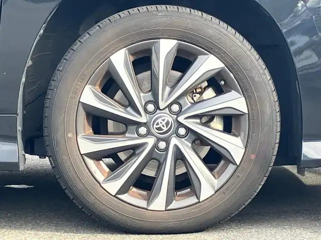 トヨタ ヴォクシー ハイブリッド S－Z 静岡県 2023(令5)年 5.9万km グリッターブラックガラスフレーク 純正10.5インチナビ(CD/DVD/BT/フルセグ)/14インチ後席モニター(V14T-R72R)/純正ETC2.0/ドライブレコーダー前後+車内/エンジンスタートボタン/パワーステアリング/パワーウィンドウ/アイドリングストップ/100V充電/スマートキー/Wオートエアコン/レーダークルーズコントロール/USB入力端子/バックカメラ/三列シート/純正フロアマット/ハーフレザーシート/D席N席シートヒーター/両側パワースライドドア/純正17インチアルミホイール/ABS/横滑り防止装置/コーナーセンサー前後/レーンキープアシスト/オートライト/オートマチックハイビーム/LEDヘッドライト/W+サイドエアバック/衝突軽減システム/HDMI接続