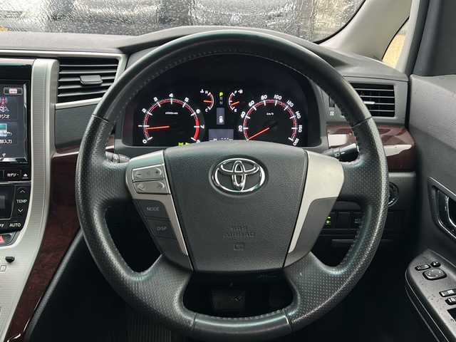 トヨタ ヴェルファイア 2．4Z 茨城県 2012(平24)年 7.4万km ブラック ALPINEナビ/【フルセグTV/CD/DVD/Bluetooth】/バックカメラ/ALPINEフリップダウンモニター/両側パワースライドドア/コーナーセンサー/横滑り防止装置/純正18インチAW/オートライト/HIDライト/革巻きステアリング/ステアリングスイッチ/純正フロアマット/電動格納ミラー