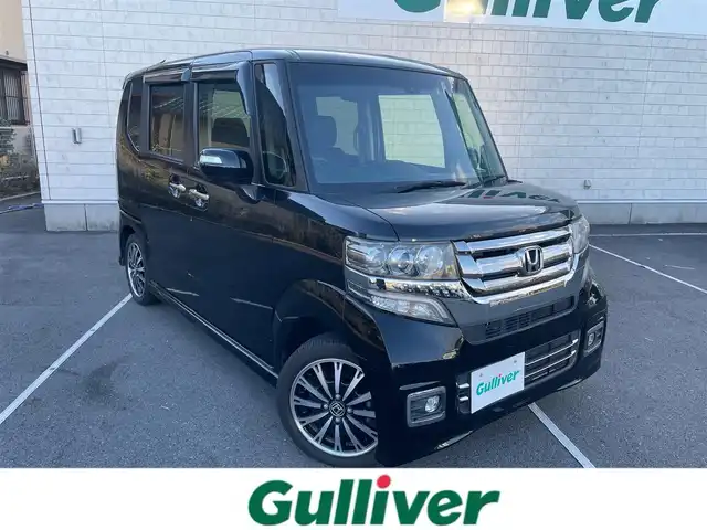 ホンダ Ｎ ＢＯＸ G ターボ Lパッケージ 静岡県 2016(平28)年 1万km クリスタルブラックパール 社外ナビ　/・フルセグＴＶ　/・Ｂｌｕｅｔｏｏｔｈ接続　/ＣＴＢＡ　/両側パワースライドドア　/クルーズコントロール　/バックカメラ/プッシュスタート　/スマートキー　/ベンチシート　/ハーフレザーシート/チップアップシート　/ＨＩＤオートライト　/ビルトインＥＴＣ