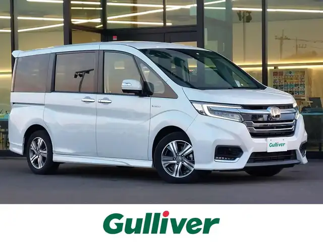 ホンダ ステップワゴン スパーダ ハイブリッド G ホンダセンシング 東京都 2019(平31)年 4.2万km プラチナホワイトパール ホンダセンシング/・衝突軽減ブレーキ/・レーンアシスト/・アダプティブクルーズコントロール/純正10インチナビ/・CD/DVD/BT/AM/FM/TV/マルチビューモニター/両側パワースライドドア/LEDヘッドライト/フリップダウンモニター/純正ドライブレコーダー/2列目ロールサンシェード/ビルトインETC