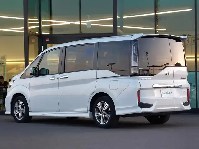 ホンダ ステップワゴン スパーダ ハイブリッド G ホンダセンシング 東京都 2019(平31)年 4.2万km プラチナホワイトパール ホンダセンシング/・衝突軽減ブレーキ/・レーンアシスト/・アダプティブクルーズコントロール/純正10インチナビ/・CD/DVD/BT/AM/FM/TV/マルチビューモニター/両側パワースライドドア/LEDヘッドライト/フリップダウンモニター/純正ドライブレコーダー/2列目ロールサンシェード/ビルトインETC