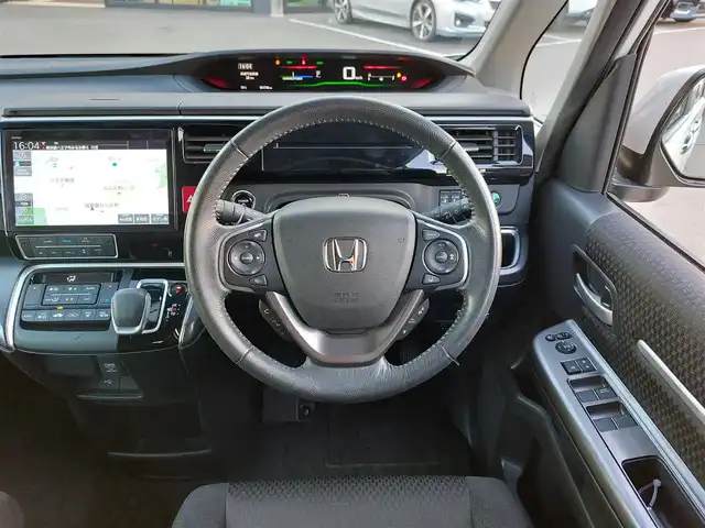 ホンダ ステップワゴン スパーダ ハイブリッド G ホンダセンシング 東京都 2019(平31)年 4.2万km プラチナホワイトパール ホンダセンシング/・衝突軽減ブレーキ/・レーンアシスト/・アダプティブクルーズコントロール/純正10インチナビ/・CD/DVD/BT/AM/FM/TV/マルチビューモニター/両側パワースライドドア/LEDヘッドライト/フリップダウンモニター/純正ドライブレコーダー/2列目ロールサンシェード/ビルトインETC