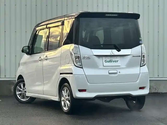 三菱 ｅＫスペース カスタムG セーフティパッケージ 山形県 2017(平29)年 6.3万km アメジストブラック/シルキーホワイト ４WD/衝突軽減システム/メモリナビ/　【CD　DVD　BT　フルセグ　USB　AUX】/全周囲カメラ/片側パワースライドドア/LEDオートライト/オートハイビーム/フォグランプ/純正14インチアルミホイール/アイドリングストップ/純正フロアマット/スマートキー/ETC