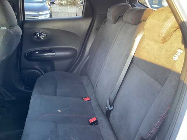 日産 ジューク ニスモ 福島県 2013(平25)年 6.5万km ブリリアントホワイトパール 純正ナビ　バックＣ　フルセグＴＶ　ＢＴ　ビルトインＥＴＣ　純正ドアバイザー　純正フロアマット　Ｄ－ＭＯＤＥ　ＮＩＳＭＯ専用シート　４ＷＤ－Ｖ　純正夏タイヤ付AW装着　プッシュスタート　スマートキー