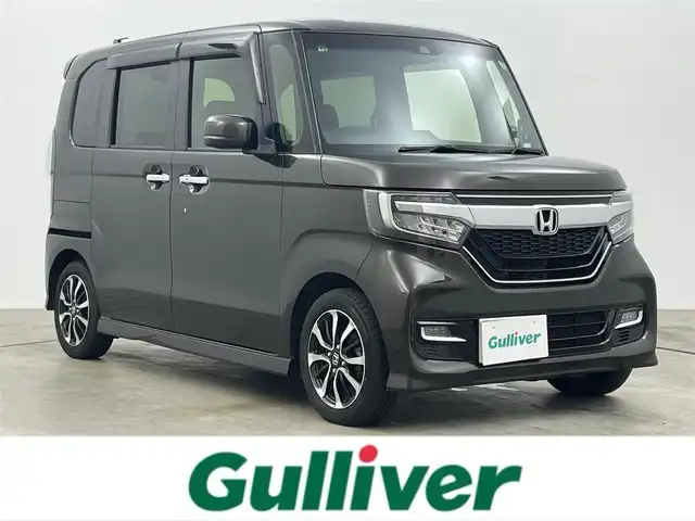ホンダ Ｎ ＢＯＸ カスタム G L ホンダセンシング 岡山県 2020(令2)年 4.7万km プレミアムグラマラスブロンズP 純正SDナビ/（CD/DVD/BT/フルセグTV）/ステアリングスイッチ/バックカメラ/ビルトインETC/左側パワースライドドア/LEDヘッドライト/オートライト/前席シートヒーター/純正フロアマット/純正ドアバイザー/純正14インチアルミ/新車保証書