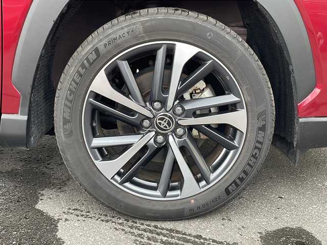 トヨタ カローラ クロス ハイブリッド Z 道北・旭川 2023(令5)年 1.2万km センシュアルレッドマイカ ・4WD/・寒冷地仕様/・禁煙車/・純正ディスプレイオーディオ/　BT/USB/・バックカメラ/・ハンズフリー電動リアゲート/・前席シートヒーター/・ハンドルヒーター/・純正エンジンスターター/・トヨタセーフティセンス/　レーンキープアシスト/　PCS/PKSB/RSA/　レーダークルーズコントロール/・オートライト/・オートマチックハイビーム/・革巻きステアリング/・ステアリングスイッチ/・ミラーヒーター/・パワーシート/・LEDヘッドライト/フォグランプ/・ハーフレザー/・純正フロアマット/・ドアバイザー/・保証書/・スペアキー