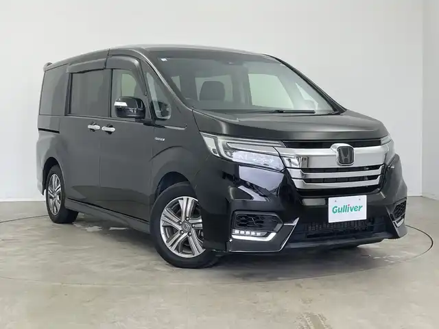 ホンダ ステップワゴン スパーダ ハイブリッド G ホンダセンシング 新潟県 2018(平30)年 5.1万km プレミアムスパークルブラックパール 純正SDナビ（Bluetooth・USB・CD・DVD）/両側パワースライドドア　/ホンダセンシング/純正ETC２．０　/フルセグ　/バックカメラ　/レーンキープアシスト　/追従クルーズコントロール/LEDオートライト　/オートマチックハイビーム/オートマチックハイビーム　/ブレーキホールド　/前方ドライブレコーダー/ステアリングスイッチ/スマートキー/スペアキー/純正フロアマット/純正１６インチアルミホイール