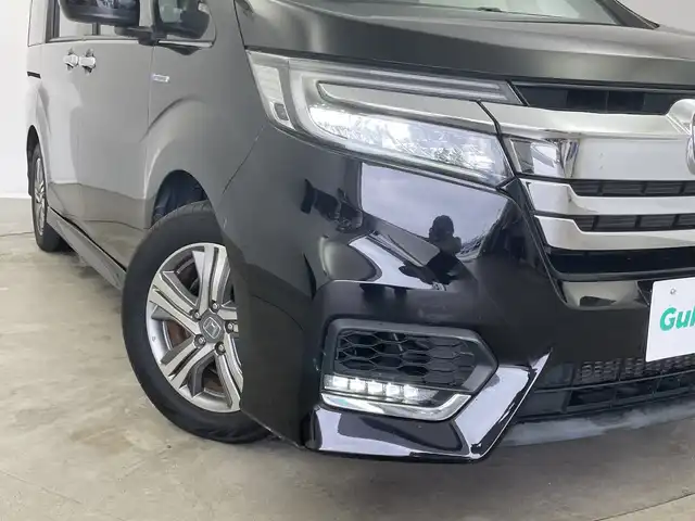 ホンダ ステップワゴン スパーダ ハイブリッド G ホンダセンシング 新潟県 2018(平30)年 5.1万km プレミアムスパークルブラックパール 純正SDナビ（Bluetooth・USB・CD・DVD）/両側パワースライドドア　/ホンダセンシング/純正ETC２．０　/フルセグ　/バックカメラ　/レーンキープアシスト　/追従クルーズコントロール/LEDオートライト　/オートマチックハイビーム/オートマチックハイビーム　/ブレーキホールド　/前方ドライブレコーダー/ステアリングスイッチ/スマートキー/スペアキー/純正フロアマット/純正１６インチアルミホイール