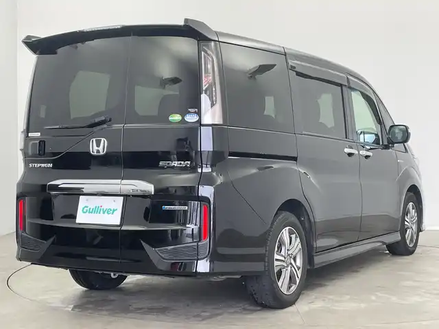 ホンダ ステップワゴン スパーダ ハイブリッド G ホンダセンシング 新潟県 2018(平30)年 5.1万km プレミアムスパークルブラックパール 純正SDナビ（Bluetooth・USB・CD・DVD）/両側パワースライドドア　/ホンダセンシング/純正ETC２．０　/フルセグ　/バックカメラ　/レーンキープアシスト　/追従クルーズコントロール/LEDオートライト　/オートマチックハイビーム/オートマチックハイビーム　/ブレーキホールド　/前方ドライブレコーダー/ステアリングスイッチ/スマートキー/スペアキー/純正フロアマット/純正１６インチアルミホイール