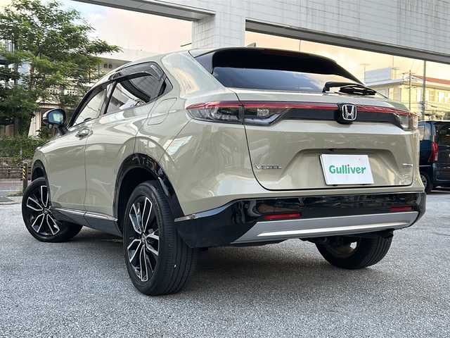 ホンダ ヴェゼル ハイブリッド e:HEV Z 沖縄県 2021(令3)年 7.7万km サンドカーキパール 純正ナビ　ＡＭ／ＦＭ／ＣＤ／ＤＶＤ／ＢＴ/フルセグＴＶ/前後ドラレコ　/ＥＴＣ　/カーテンエアバッグ　/パワーバックドア　/ダウンヒルアシストコントロール　/クルコン　/前席シートヒーター　/ワイヤレス充電器