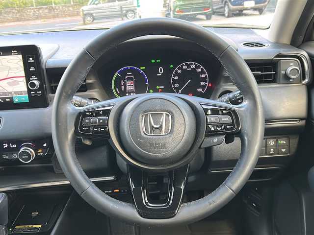 ホンダ ヴェゼル ハイブリッド e:HEV Z 沖縄県 2021(令3)年 7.7万km サンドカーキパール 純正ナビ　ＡＭ／ＦＭ／ＣＤ／ＤＶＤ／ＢＴ/フルセグＴＶ/前後ドラレコ　/ＥＴＣ　/カーテンエアバッグ　/パワーバックドア　/ダウンヒルアシストコントロール　/クルコン　/前席シートヒーター　/ワイヤレス充電器