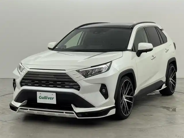 トヨタ ＲＡＶ４ G 福岡県 2022(令4)年 1.8万km ホワイトパールクリスタルシャイン サンルーフ　/ＲＯＷＥＮフルエアロ／ＡＷ／マフラー／ハンドル　/キャッツアイテールランプ　/アルパインデジタルルームミラー　/アルパイン前後ドラレコ　/ビルトインETC　/アルパインビッグＸナビ　/全方位カメラ　/レーダークルコン　/コーナーセンサー　/セーフティセンス　/衝突軽減ブレーキ　/レーンキープ　/ブラインドスポットモニター　/ＰＫＳＢ　/シートベンチレーション／ヒーター　/ステアリングヒーター　/パワーバックドア/ＬＥＤヘッドライト　/車高調