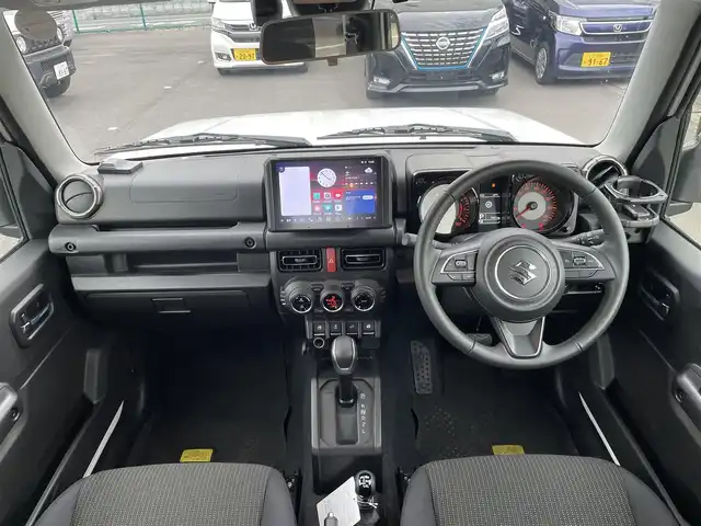 スズキ ジムニー シエラ JC 東京都 2025(令7)年 0.8万km ピュアホワイトP ワンオーナー/４ＷＤ/ディスプレイオーディオ/ＡＭ／ＦＭ／Ｂｌｕｅｔｏｏｔｈ/バックカメラ/衝突軽減ブレーキ/ヒルディセントコントロール/デュアルセンサーブレーキ/クルーズコントロール/ＥＴＣ/ドライブレコーダー