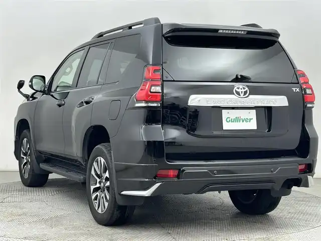 トヨタ ランドクルーザー プラド TX Lパッケージ 道央・札幌 2022(令4)年 1万km ブラック ・４WD/・寒冷地仕様/・サンルーフ/・モデリスタエアロ/・ケンウッド７V型SDナビ/　CD/DVD/SD/USB/BT/フルセグTV/　ステアリングスイッチ非連動/・バックカメラ/・ビルトインETC/・ドライブレコーダー（ADR300S）/・トヨタセーフティセンス/　PCS/PKSB/LDA/RSA/　クリアランスソナー/先行車発進告知/・アダプティブクルーズコントロール/・横滑り防止装置/・ABS/・オートマチックハイビーム/・オートライト/・LEDヘッドライト/・フォグランプ/・ドアミラーウィンカー/・オートリトラクタブルドアミラー/・レザーシート/・D+N席パワーシート/・D+N席シートヒーター＆ベンチレーション/・電動格納サードシート/・純正フロアマット/・純正１９インチAW/・プッシュスタート/・スマートキー/・保証書