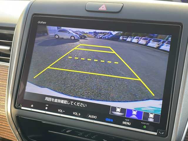 ホンダ フリード ハイブリット クロスター 福岡県 2023(令5)年 4.1万km プラチナホワイトパール 純正9インチナビ/（AppleCarPlay/TV/DVD/CD/HDMI/USB/AM/FM）/バックカメラ/純正15.6インチフリップダウンモニター（VM-231FE）/両側パワースライドドア/レーダークルーズコントロール/純正前方ドライブレコーダー/シートヒーター/純正15インチホイール/車線逸脱警報/横滑り防止装置/プリクラッシュ/LEDヘッドライト/後席テーブル/後席サンシェード/スペアキー/スマートキー/純正ドアバイザー/ステアリングスイッチ/電格ミラー/純正フロアマット