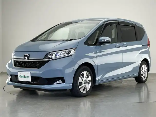 ホンダ フリード ハイブリット G ホンダセンシング 愛知県 2021(令3)年 3.6万km シーグラスブルーパール 純正９型ナビ　バックカメラ　両側パワスラ　禁煙　フルセグ　DVD　追従クルコン　ホンダセンシング　ETC　ドラレコ　シートヒーター　衝突軽減　車線逸脱　LEDオートライト　USB接続　コーナーセンサー　純正フロアマット　プッシュスタート　スマートキー