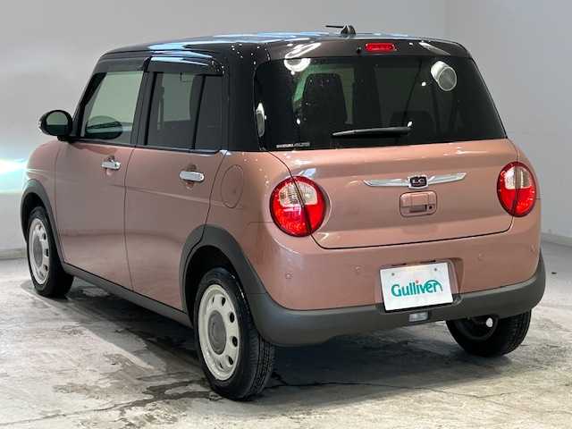 スズキ ラパン ＬＣ X 宮城県 2022(令4)年 2.9万km テラコッタピンクメタリック/アーバンブラウン 2トーン 車線逸脱警報装置/クリアランスソナー/横滑り防止装置/衝突軽減システム/KENWOODオーディオ/・Bluetooth/CD/USB/・ETC/アイドリングストップ/革巻きステアリング/・ステアリングスイッチ/シートヒーター（運転席/助手席）/プッシュスタート/・スマートキー/純正フロアマット/純正アルミホイール 14インチ/ドアバイザー