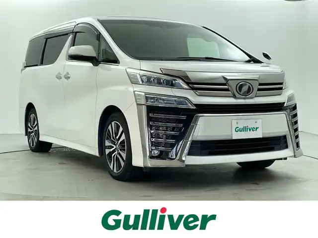 トヨタ ヴェルファイア Z Gエディション 福井県 2018(平30)年 5.1万km ホワイトパールクリスタルシャイン 純正10インチナビ　型式：NSZN-Z66T/（AM/FM/BT/CD/DVD/TV）/バックカメラ/フリップダウンモニター/サンルーフ/両側パワースライドドア/パワーバックドア/本革シート/コーナーセンサー/純正アルミホイール/ETC2.0/三眼LEDヘッドライト/ステアリングヒーター/レーンキープアシスト/ドライブレコーダー/ステアリングスイッチ/スマートキー/プッシュスタート