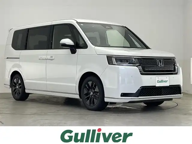 ホンダ ステップワゴン スパーダ eHEV 滋賀県 2025(令7)年 0.1万km未満 プラチナホワイトパール 登録済未使用車/純正11.4インチホンダコネクトナビ/【LXM-247VFLi】/（CD/DVD/フルセグ/Bluetooth/USB）/両側パワースライドドア/電動リアゲート/クリアランスソナー/シートヒーター/LEDヘッドライト/純正１６AW/ビルトインETC/ステアリングスイッチ/プッシュスタート/タイプC充電