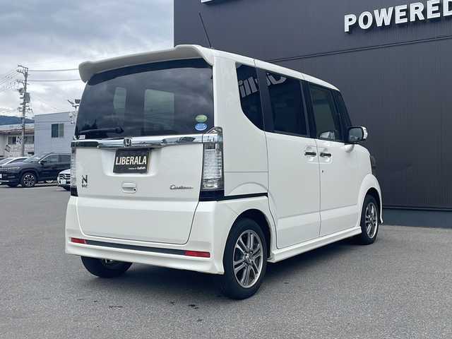 ホンダ Ｎ ＢＯＸ カスタム G SSパッケージ 愛知県 2014(平26)年 4.9万km プレミアムホワイトパール ・純正ナビ(CD/DVD/BT/FM/AM)　/・TV/・両側パワースライドドア/・ETC/・バックカメラ/・CTBA/・純正アルミホイール　/・社外AW付冬タイヤ車載　/・キセノンヘッドライト　/・フォグランプ　/・純正フロアマット