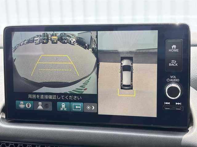 ホンダ ＺＲ－Ｖ ハイブリッド e:HEV Z 滋賀県 2024(令6)年 1.3万km ミッドナイトブルービームM 純正9インチナビ/（BT/フルセグ/USB）/全方位カメラ/ビルトインETC2.0/BOSEサウンド/ダウンヒルアシスト/ワイヤレス充電/レザーシート/メモリ付きパワーシート/シートヒーター/ステアリングヒーター/ホンダセンシング/・衝突軽減ブレーキ/・前後誤発進抑制/・ブラインドスポットインフォメーション/・追従クルーズコントロール/・レーキープアシスト/・トラフィックジャムアシスト/・標識認識機能/・歩行者事故低減ステアリング/・パーキングセンサー/・後退出庫サポート/・オートハイビーム/・アダプティブコーナリングライト