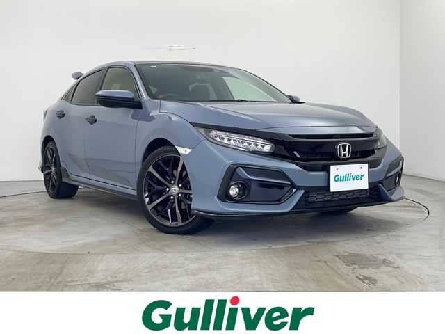 ホンダ シビック ハッチバック 秋田県 2020(令2)年 1.9万km ソニックグレーパール 純正ナビ(CD/DVD/BT/フルセグ)/[VXM-204VFi]/トップロードサンルーフ/運転席8Way/助手席4Wayパワーシート/Honda SENSING/・衝突軽減ブレーキ〈CMBS〉/・歩行者事故低減ステアリング/・路外逸脱抑制機能/・渋滞追従機能付ACC〈アダプティブ・クルーズ・コントロール)/・LKAS〈車線維持支援システム〉/・先行車発進お知らせ機能/・オートハイビーム/・標識認識機能/バックカメラ/運転席＆助手席シートヒーター/ETC2.0車載器/電子制御パーキングブレーキ/オートブレーキホールド機能/Hondaスマートキーシステム/パドルシフト/前後ドライブレコーダー/ヒーテッドドアミラー/純正18インチアルミホイール