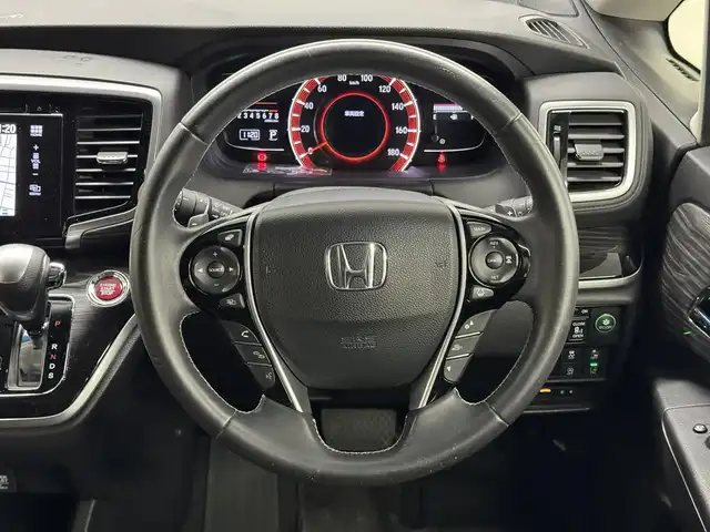ホンダ オデッセイ アブソルート EX ADV 三重県 2015(平27)年 7.1万km クリスタルブラックパール ガソリン/FF/MTモード付インパネCVT/純正 7インチナビ/（FM/AM/CD/DVD/USB/iPod/Bluetooth/TV/HDMI/後席HDMI）/純正 9インチ後席モニター/マルチビューカメラシステム（360カメラ）/両側パワースライドドア/ビルトインETC/Honda SENSING/・衝突軽減ブレーキ［CMBS］/・車線維持支援システム［LKAS］/・路外逸脱抑制機能/・アダプティブクルーズコントロール［ACC］/・先行車発進お知らせ機能/・ブラインドスポットシステム/・標識認識機能（常駐表示機能付）/・スマートパーキングアシストシステム/装備/・ハーフレザーシート/・パワーシート（D8way）/・トリプルゾーンコントロール・フルオートエアコン（前席左右＋後席）/・プレミアムクレードル2ndシート（オットマン・バックシェル付）/・オートライト/・LEDヘッドライト/・電動格納ドアミラー（ヒーター付）/・パドルシフト/・ステアリングスイッチ/・社外AW（18×7J ＋52 114.3-5）あり/・プッシュスタート/・スマートキーx3/など
