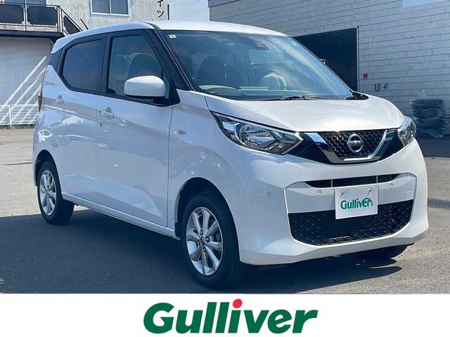 日産 デイズ X 道東・釧路十勝 2023(令5)年 1.4万km ホワイトパール 4WD/ナビ　/　(AM/FM/BT)/マイパイロット/ETC/ミラー型バックカメラ/社外14インチAW/社外フロアマット/アイドリングストップ/オートライト/ABS/横滑り防止装置/USB入力端子