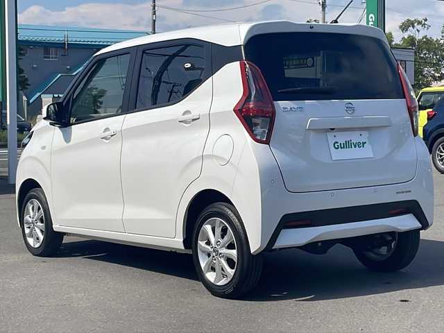 日産 デイズ X 道東・釧路十勝 2023(令5)年 1.4万km ホワイトパール 4WD/ナビ　/　(AM/FM/BT)/マイパイロット/ETC/ミラー型バックカメラ/社外14インチAW/社外フロアマット/アイドリングストップ/オートライト/ABS/横滑り防止装置/USB入力端子