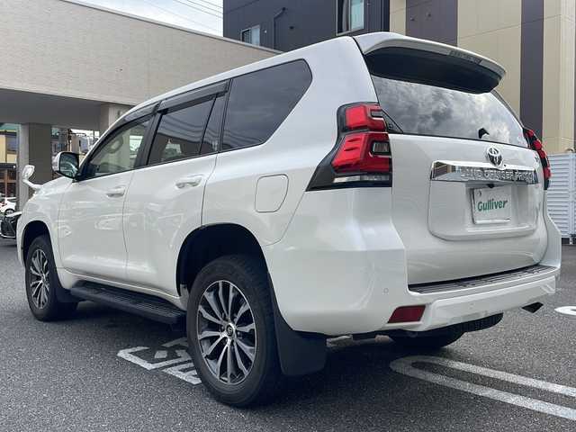 トヨタ ランドクルーザー プラド TX Lパッケージ 広島県 2020(令2)年 2.7万km ホワイトパールクリスタルシャイン /登録時走行距離/　　　　　　　26421キロ/ワンオーナー/4WD/純正ナビ/バックカメラ/地デジ/黒革シート/エアシート/PCS/スペアキー×１/ビルトインETC/新車時整備手帳/　　【保証書】/取扱説明書/