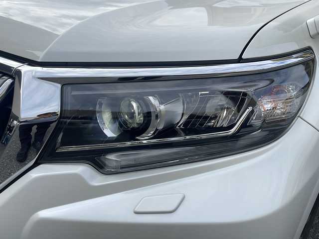 トヨタ ランドクルーザー プラド TX Lパッケージ 広島県 2020(令2)年 2.7万km ホワイトパールクリスタルシャイン /登録時走行距離/　　　　　　　26421キロ/ワンオーナー/4WD/純正ナビ/バックカメラ/地デジ/黒革シート/エアシート/PCS/スペアキー×１/ビルトインETC/新車時整備手帳/　　【保証書】/取扱説明書/
