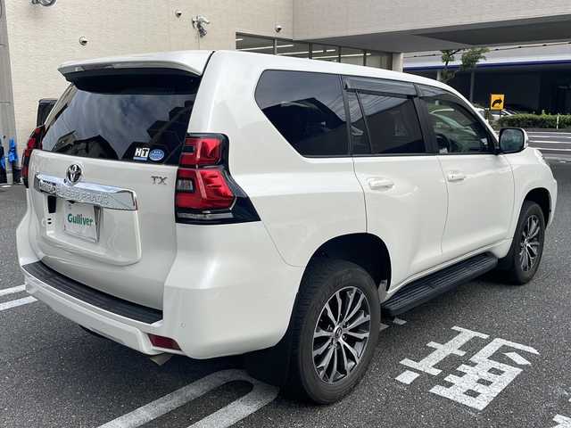 トヨタ ランドクルーザー プラド TX Lパッケージ 広島県 2020(令2)年 2.7万km ホワイトパールクリスタルシャイン /登録時走行距離/　　　　　　　26421キロ/ワンオーナー/4WD/純正ナビ/バックカメラ/地デジ/黒革シート/エアシート/PCS/スペアキー×１/ビルトインETC/新車時整備手帳/　　【保証書】/取扱説明書/